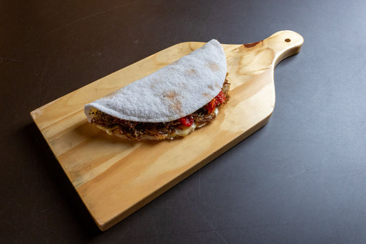 Foto apetitosa de tapioca recheada em destaque, ilustrando a receita apresentada no blog Granuz