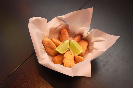 Foto apetitosa de coxinha de frango cremosa em destaque, ilustrando a receita apresentada no blog Granuz
