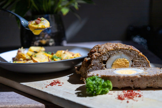 Foto apetitosa de rocambole de carne moída em destaque, ilustrando a receita apresentada no blog Granuz