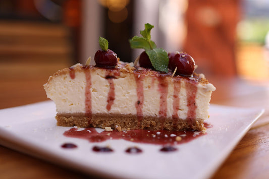 Foto apetitosa de cheesecake em destaque, ilustrando a receita apresentada no blog Granuz